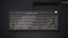 Load image into Gallery viewer, FR4 Plate for the GMMK Pro, designed by AVX Works with several switches, gold knob, and black coiled cable with gold connector.
